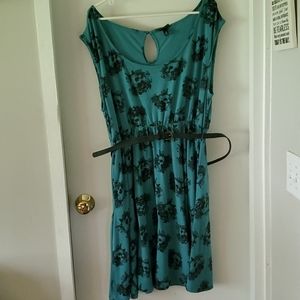 Teal dress with belt, skull and flower details
